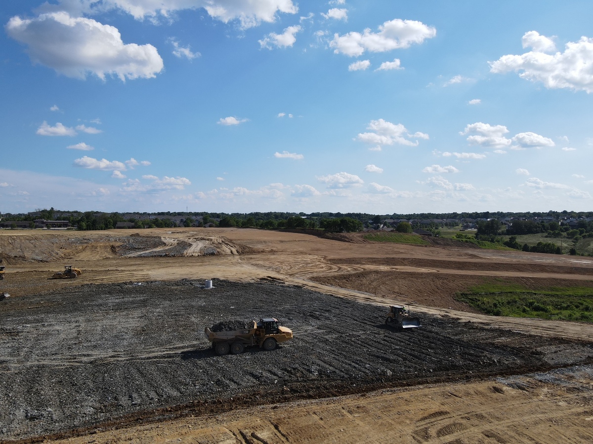 construction vehicles working in distance